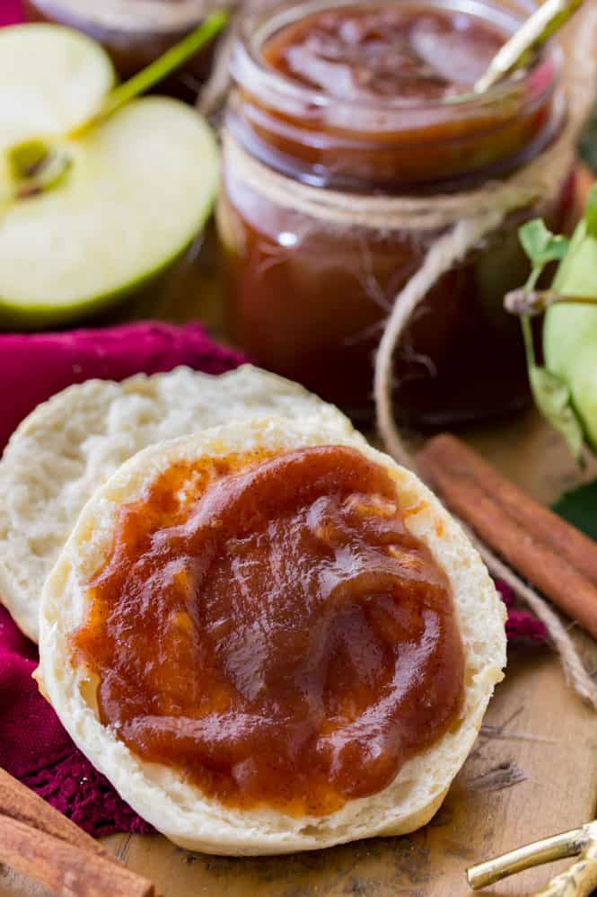 Apple butter spread on to biscuit