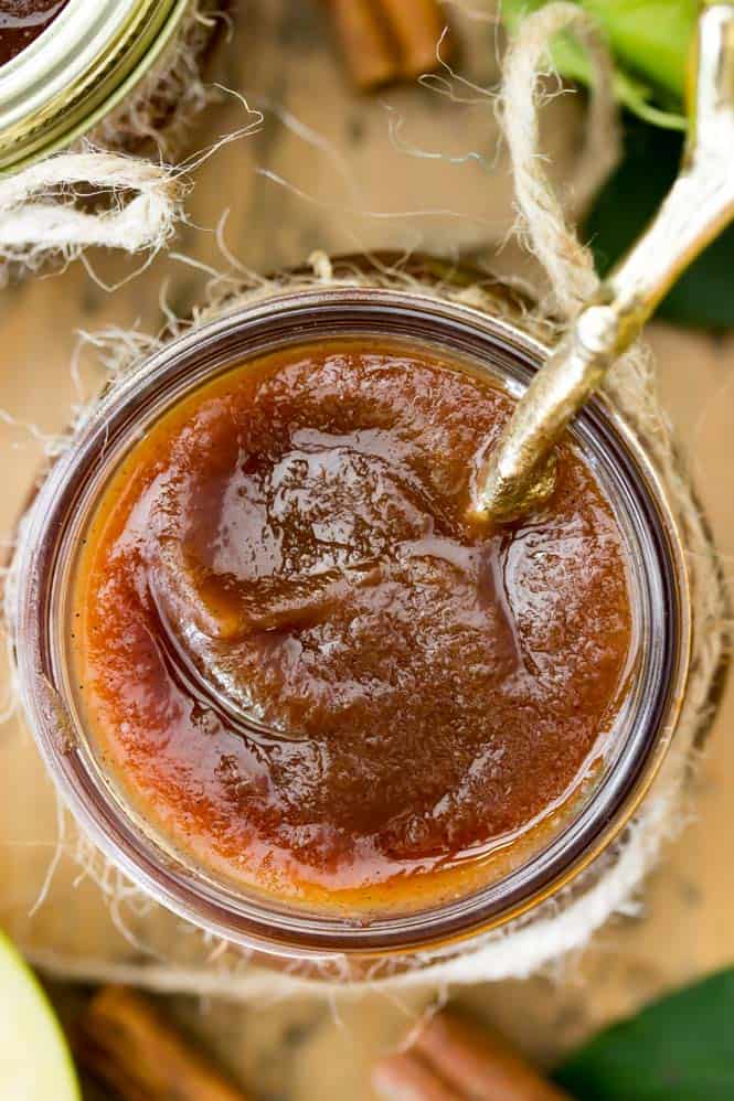 Overhead of apple butter in glass jar