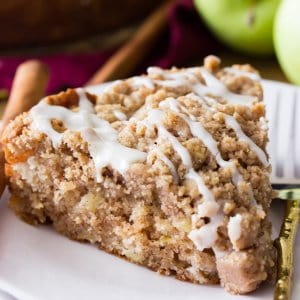 Slice of apple crumb cake on plate