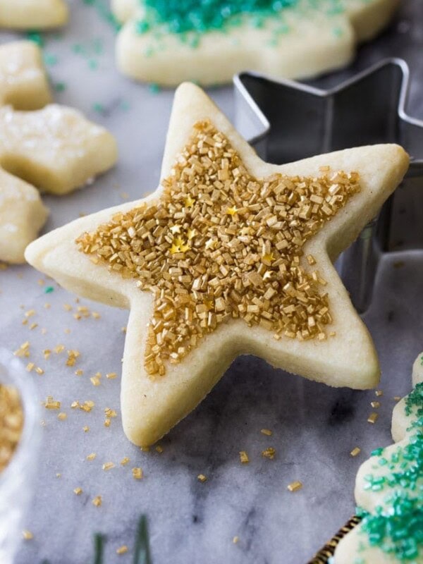 Star shaped sugar cookie with gold sprinkles