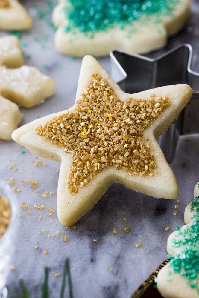 Star shaped sugar cookie with gold sprinkles