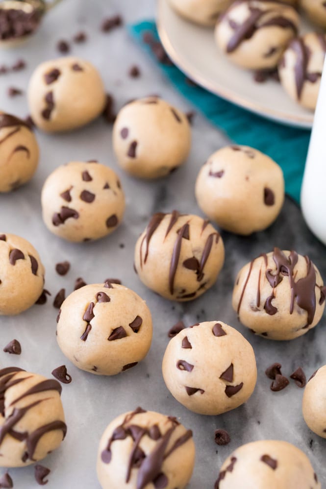 Cookie dough bites on white marble board