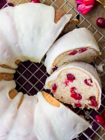 Overhead image of sliced, iced cranberry bundt cake