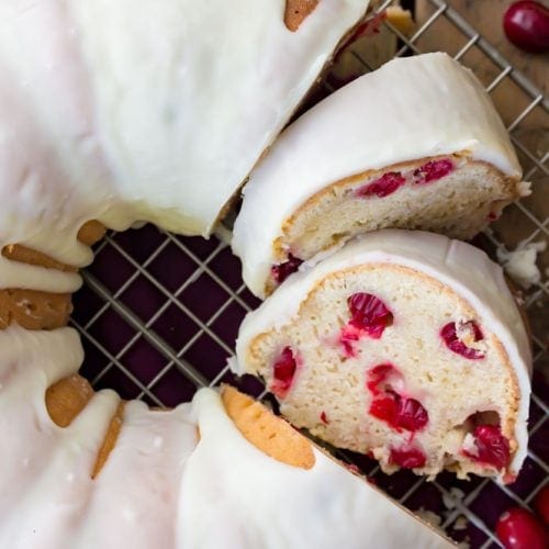 Overhead image of sliced, iced cranberry bundt cake