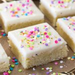 Sugar cookie bar square with white icing and sprinkles