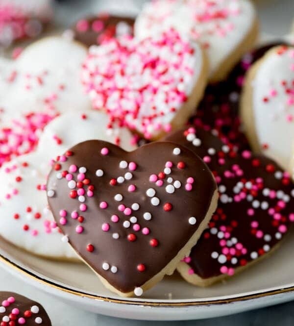 Heart shaped cookies with icing and sprinkles
