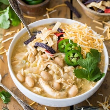 White Chicken chili in a bowl with toppings