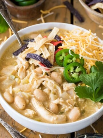 White Chicken chili in a bowl with toppings