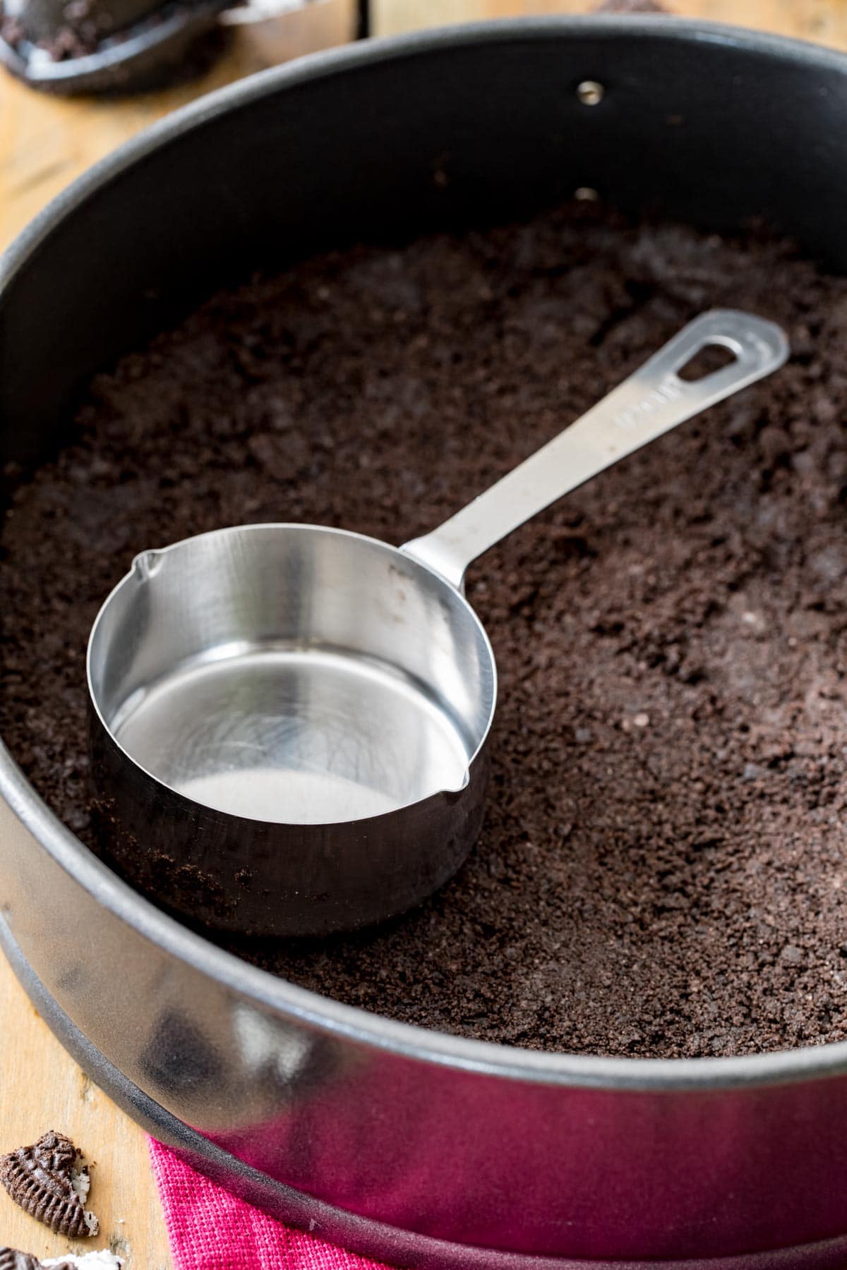 Packing oreo crumbs in pan