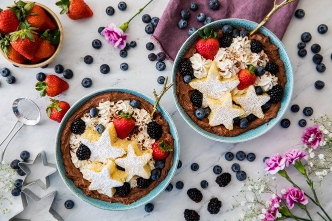 Two dessert bowls on marble