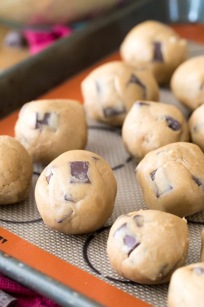 Rolled balls of chocolate chip cream cheese cookie dough