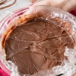 Plastic wrap pressed onto chocolate pudding in bowl