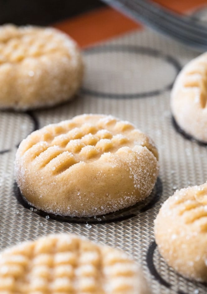 Ball of peanut butter cookie dough on baking sheet