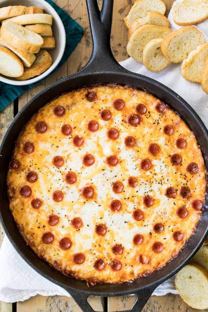 Cast Iron skillet of pepperoni pizza dip