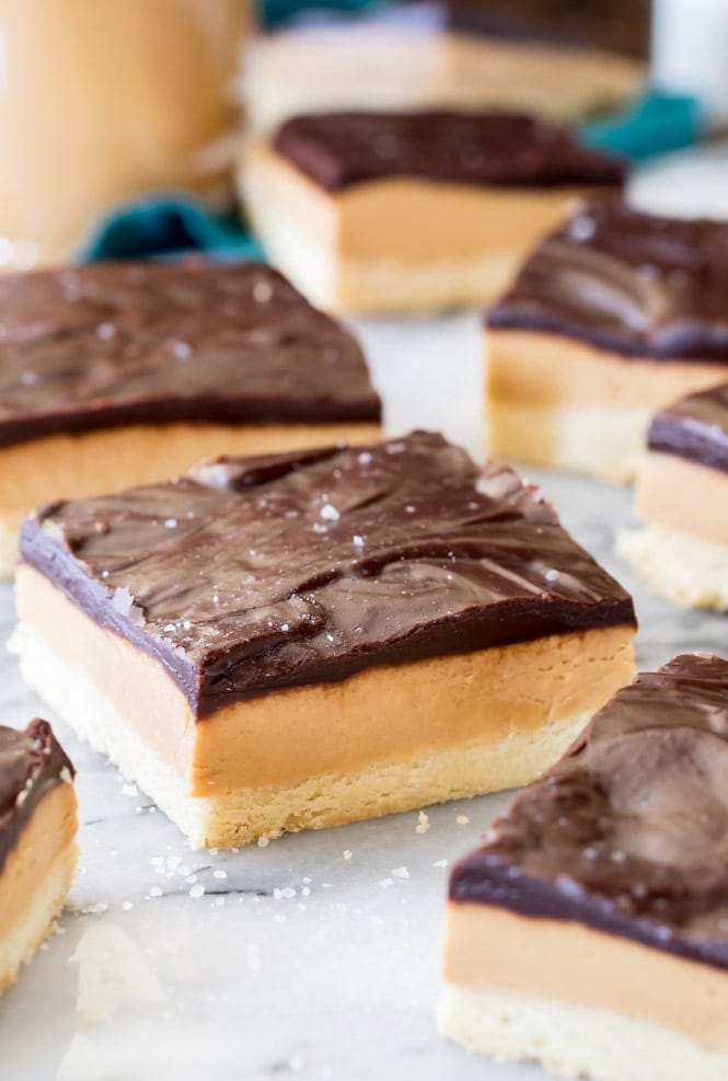 Peanut Butte rShortbread Bars topped with fudgy chocolate ganache and a sprinkle of sea salt