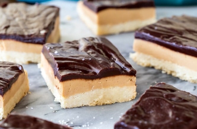Peanut Butte rShortbread Bars topped with fudgy chocolate ganache and a sprinkle of sea salt