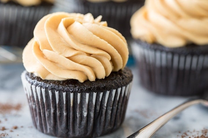 peanut butter frosting on a chocolate cupcake