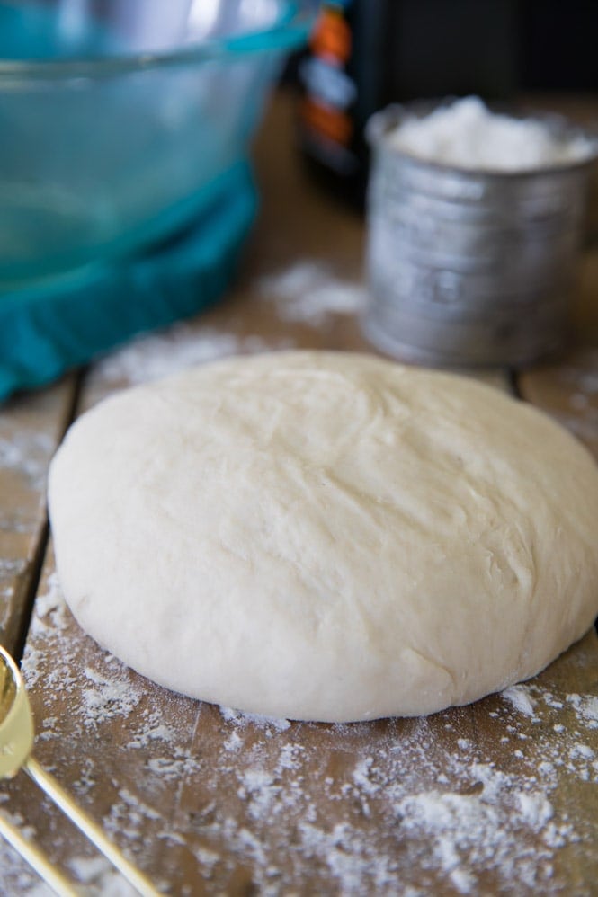 Pizza dough formed into a ball before rising