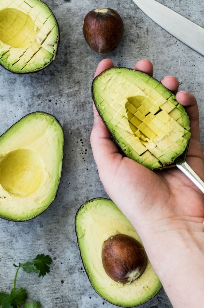 Scoring an avocado to easily scoop out the inside