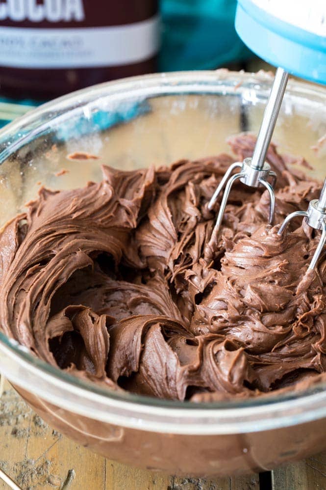 creamy chocolate cream cheese frosting in a bowl