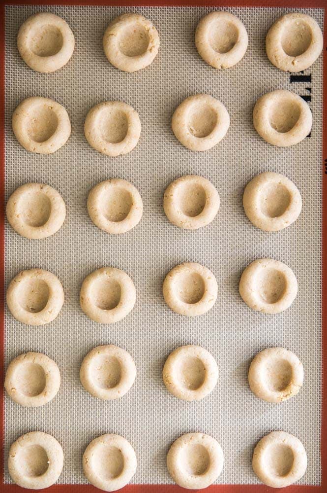 Key Lime Pie Thumbprint cookie dough on a silpat mat