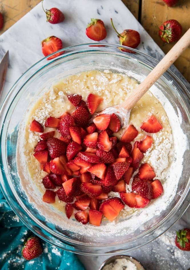 strawberry muffin batter with fresh strawberries