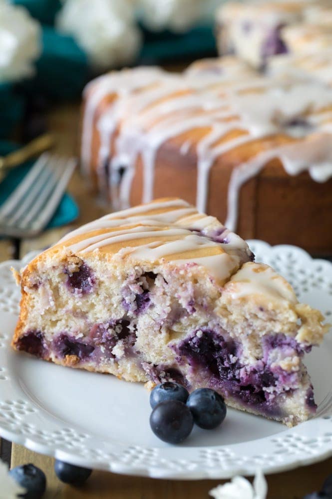 slice of blueberry cake on a white plate