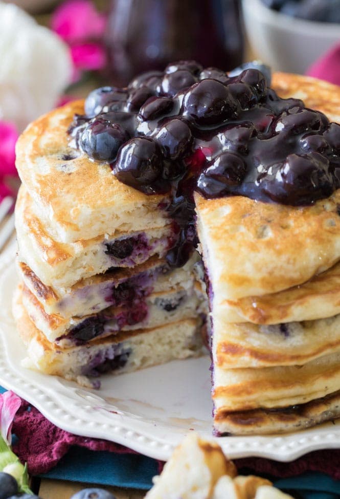 Blueberry pancakes topped with blueberry sauce