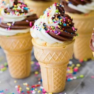 Ice cream cone cupcake with icing and sprinkles