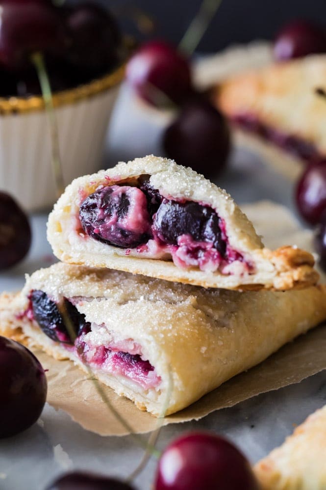 The inside of a cherry cheesecake turnover