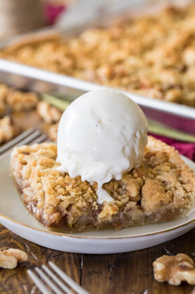 slice of apple slab pie topped with ice cream