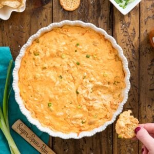 overhead of buffalo chicken dip in white dish