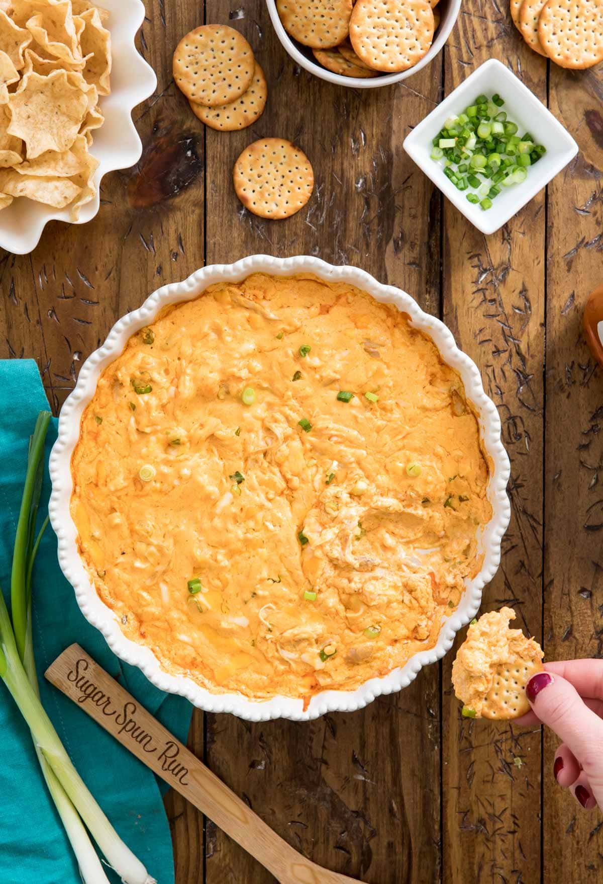 overhead of buffalo chicken dip in white dish