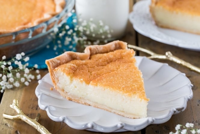 Slice of buttermilk pie on white plate