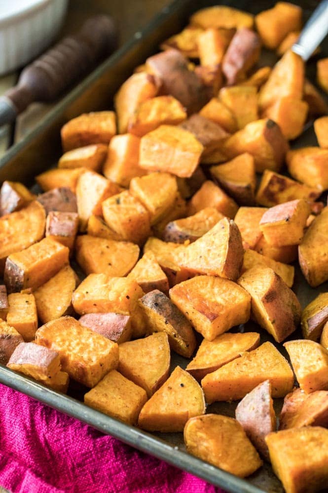 Roasting sweet potatoes on a baking sheet