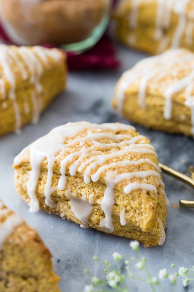 pumpkin scone drizzled with vanilla glaze