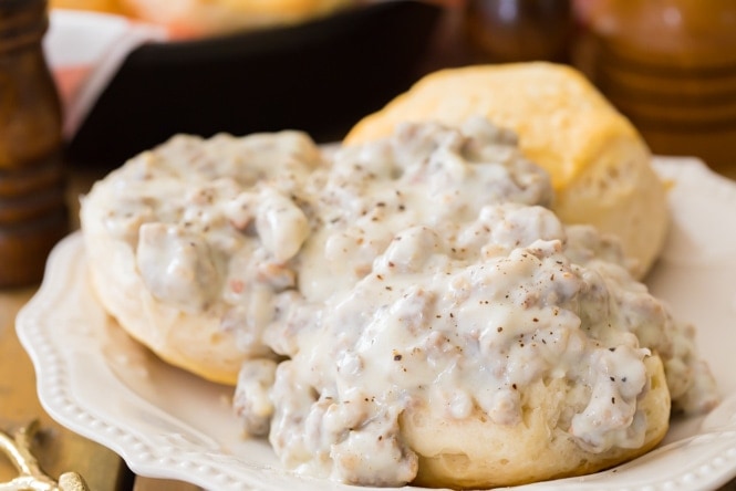 Plate of sausage gravy and biscuits