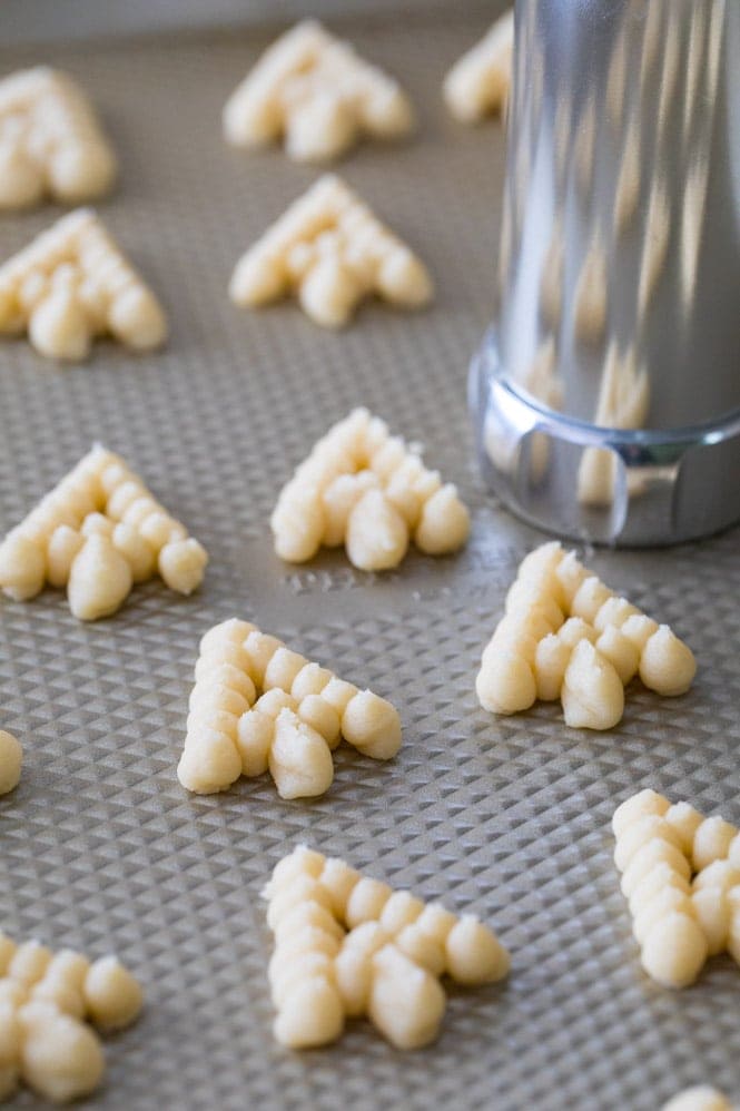 Using cookie press to make spritz cookie