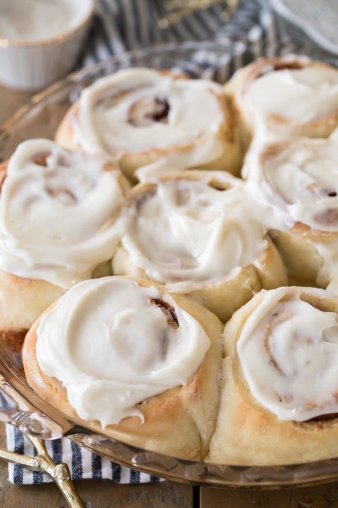 fluffy golden cinnamon rolls with cream cheese frosting
