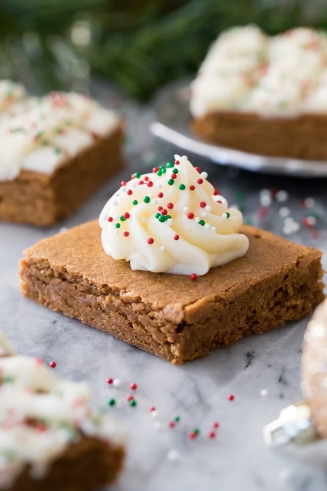 Gingerbread cookie bar square decorated with icing and sprinkles