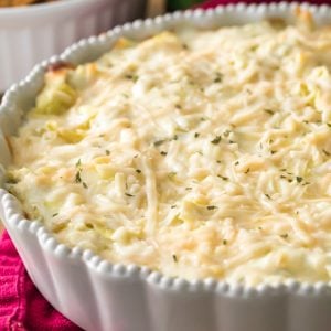 artichoke dip in white pie plate