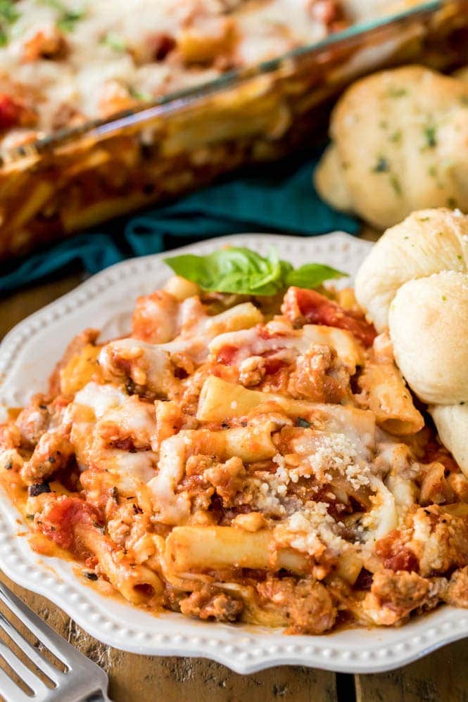 A saucy plate of the best baked ziti with melty cheese