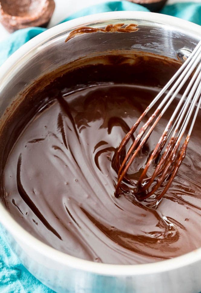 Making ganache for brownie bites