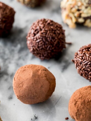 Chocolate truffles on marble surface
