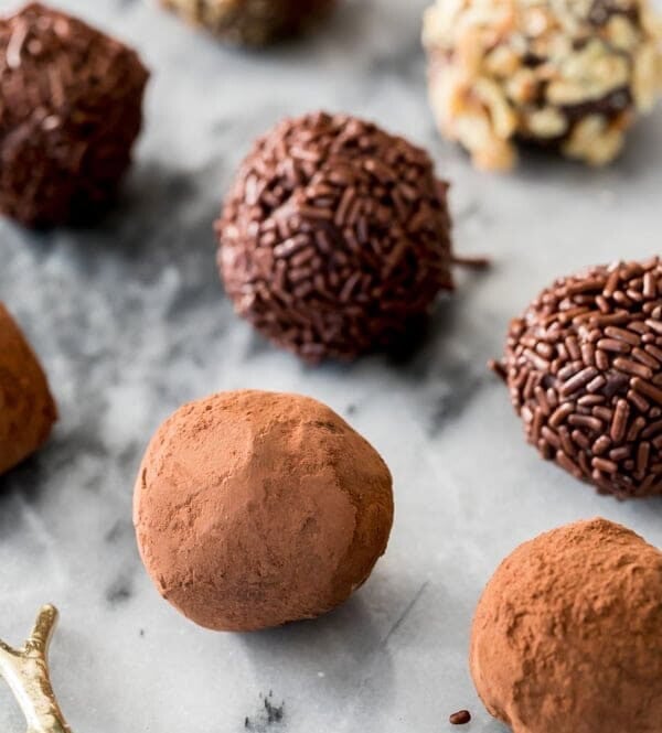 Chocolate truffles on marble surface