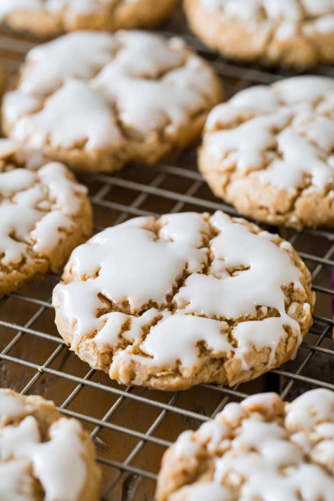 Iced oatmeal cookie on cooling rack