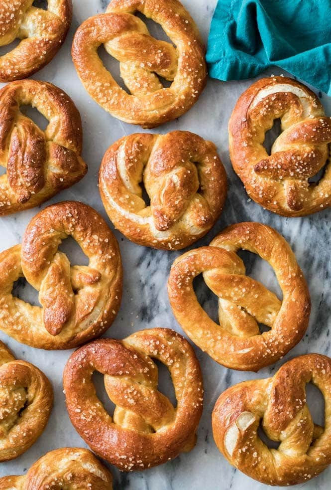 golden brown soft pretzels cooling after baking