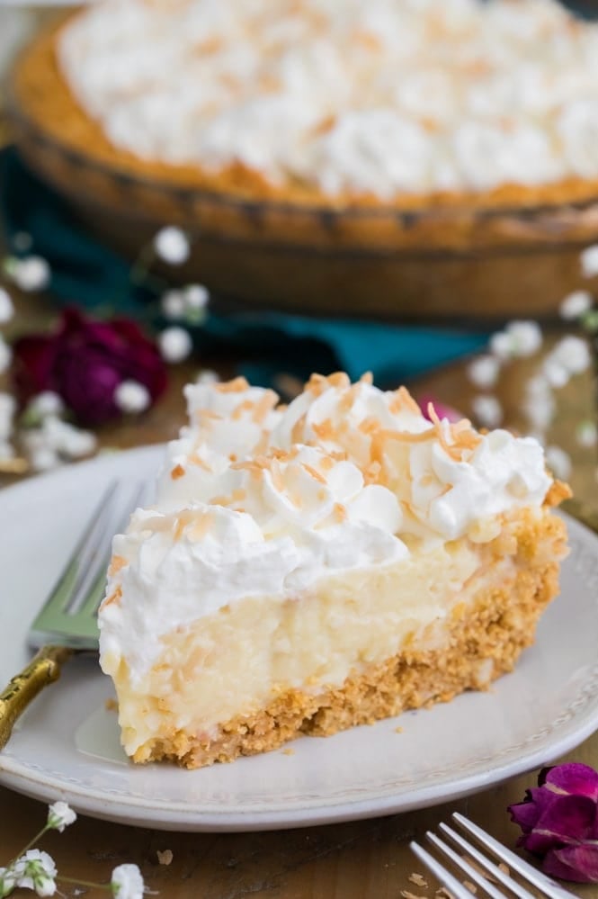 Slice of coconut cream pie on plate