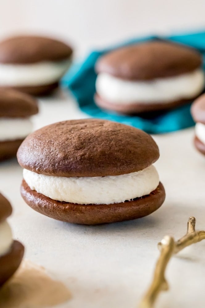 A gob/whoopie pie sandwich cookie on white board