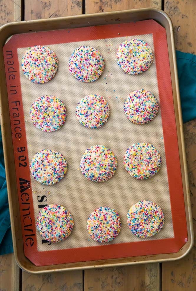 Sprinkle cookies on baking pan after baking